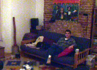 bryan in the flat's living room