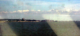 looking out the bow of the ferry coming into the industrial port of holland de hoek